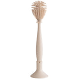 Mushie goupillon en silicone shifting sand 70.090.02